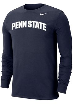 Show off your team pride in this Penn State Nittany Lions Navy Blue Dri-FIT Arch Name Long Sleeve T Shirt! This Penn State Long Sleeve Tee features a screen print of Penn State arched across front chest. Make sure everyone knows you root for the Nittany Lions with this Navy Blue Penn State T Shirt. Go Lions! Dri-FIT moisture-wicking technology, Classic fit, Crew neckline, Screen printed team graphic on left chest, Team graphic down right sleeve, Iconic Nike swoosh below team graphic, 57% COTTON Collegiate Athletic Heather Tops For Sports Events, Navy Fan Apparel Tops For Sports, Athletic Heather Collegiate Sports Top, Navy Team Name Jersey Tops, Collegiate Blue Activewear For Sports, Collegiate Blue Activewear For Sports Season, Blue Sportswear Tops For Game Day, Navy Tops With Team Logo For Sports Season, Navy Moisture-wicking Tops For Sports Season