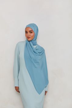 This Chiffon LITE Hijab is our lightest chiffon hijab yet. This lightweight chiffon features a subtle textured finish to hold it in place, and is perfectly wearable for everyday styles. Features lightweight sheer - opaque when folded subtle texture Measurements Standard: approx. 180 cm x 70 cm (70" x 27") Solid Color Chiffon Hijab In Modest Style, Solid Chiffon Hijab Modest Style, Modest Solid Color Chiffon Hijab, White Dress Formal, Nikkah Dress, Dresses Flowy, Chiffon Hijab, Engagement Dresses, Dress Satin