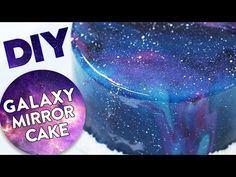 a galaxy cake with blue and purple icing on it, next to a sticker that says diy