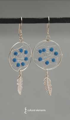 These boho-inspired earrings feature the tiniest dreamcatchers! Dreamcatchers originated from the Ojibwe tribe, who originally made them to protect sleeping children from nightmares. The woven netting was said to resemble a spider’s web, and bad dreams would get caught in the net like a fly in a spider trap. Bohemian Silver Plated Drop Earrings, Bohemian Silver-plated Drop Earrings, Bohemian Silver Plated Wire Earrings For Jewelry Making, Handmade Bohemian Silver Plated Earrings, Handmade Bohemian Silver-plated Earrings, Bohemian Nickel-free Silver-plated Wire Earrings, Bohemian Silver Plated Nickel-free Jewelry, Bohemian Nickel-free Silver-plated Jewelry, Hippie Adjustable Nickel-free Earrings