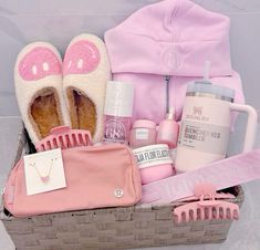 a pink basket filled with personal care items