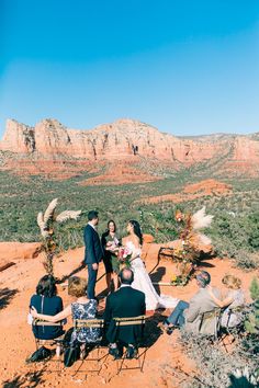 a couple getting married in the desert