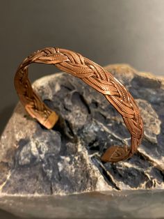 Beautiful handmade pure copper braided design healing cuff bracelet from Nepal.Adjustable,wearable & interesting hand work design and style healing cuff bracelet. Copper helps maintain healthy bones, blood vessels, nerves, and immune function, and it contributes to iron absorption. Sufficient copper in the diet may help prevent cardiovascular disease and osteoporosis, too. Copper was the first metal ever used by humans. Middle Eastern artisans of the 5th & 6th millennia B.C fashioned this copper Adjustable Brown Copper Braided Bracelets, Adjustable Copper Braided Bohemian Bracelet, Adjustable Copper Bohemian Braided Bracelet, Adjustable Bohemian Copper Braided Bracelet, Handmade Adjustable Bronze Braided Bracelets, Copper Braided Bangle Bracelet Gift, Handmade Copper Braided Bangle Bracelet, Adjustable Copper Cuff Bracelet Spiritual Style, Adjustable Copper Spiritual Cuff Bracelet