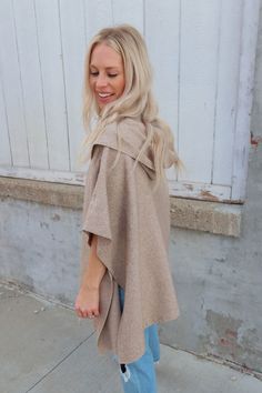 Wrap yourself in style and comfort with our My Go To Beige Open Poncho! Perfect for any season, this hooded poncho features two front pockets and short sleeves for added convenience and versatility. Stay cozy and chic, all while making a statement with this must-have wardrobe staple. -One Size Fit -Model 5'6" -Fabric: 47% Viscose, 30% Polyester, 23% Nylon Oversized Cozy Poncho For Outdoor, Beige Hooded Poncho For Fall, Oversized Short Sleeve Poncho, Open Poncho, Athletic Dresses, Hooded Poncho, Denim Gift, Romper Dress, Vest Dress