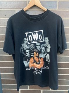 "Vintage 1998 WCW NWO Wrestling T-Shirt - Size L (Length 27\", Chest 21.5\") - Overall great vintage condition (no holes/no stains) - Great black fade on it - Message me for more information Please take note of the measurements listed as these are vintage clothes and may fit different than the tag size. Follow our page for more vintage clothing drops!" Wwe Vintage Shirts, Nwo Wrestling, Wrestling Shirt, Scott Hall, Black Fade, Wrestling Shirts, Fade To Black, Vintage Clothes, Pro Wrestling