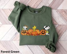 Dog Autumn Pumpkin Unisex Sweatshirt And Hoodie  Retro Snoopy Halloween Shirt  Pumpkins Shirt  Peanuts Halloween  Fall Sweatshirt  SnoopyDog Autumn Pumpkin Unisex Sweatshirt And Hoodie  Retro Snoopy Halloween Shirt  Pumpkins Shirt  Peanuts Halloween  Fall Sweatshirt  Snoopy   This model reduces inventory waste and allows customers to create personalized designs. These t-shirts are made from high-quality materials and come in a range of sizes and colors, making them versatile for any occasion. Dog Autumn, Peanuts Halloween, Snoopy Halloween, Halloween Hoodie, Light Blue Shirts, Pumpkin Shirt, Halloween Fall, Snoopy And Woodstock, Cozy Fits