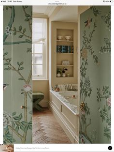 an image of a bathroom with wallpaper on the walls and in the bathtub