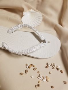 "Very simple Flat wedding sandals flipflop style 1/2\" heel. Very dressy and simple please look at the pictures. Sizes: Small: 5.5 - 6.5 Medium: 7-8 Large: 8.5 - 9.5, X-Large: 10 - 11 Please contact for any questions ON SIZING, or ANY other concerns. FINAL SALE, NO RETURNS, NO EXCHANGES, NO EXCEPTIONS." Adjustable Ankle Strap Flip Flops For Beach Season, White Adjustable Sandals For Beach, Adjustable White Sandals For Beach, Adjustable Ankle Strap Flip Flops For Vacation, Adjustable Open Toe Beachy Flip Flops, Elegant Single Toe Strap Flip Flops For Vacation, White Sandals With Adjustable Single Toe Strap, White Open Toe Barefoot Sandals For Summer, White Adjustable Sandals With Single Toe Strap