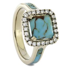 a gold ring with blue and white stones in the shape of a square, surrounded by diamonds