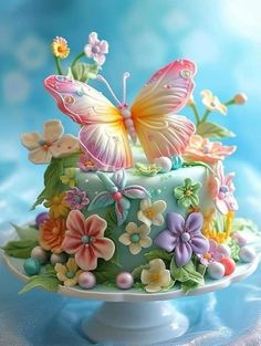 there is a cake decorated with flowers and butterflies