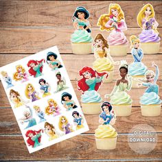 the disney princess cupcakes are decorated with frosting