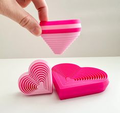 Here is a fidget toy you are sure to love ❤ The small heart would be a perfect toy for a valentine exchange in school:) These are digital files only. Purchase includes STL file for:  (1) Large Heart Layered Fidget   (2) Small Heart Layered Fidget 3D PRINTING SETTINGS: Layer Height 0.2mm PLA works great 15-20% Infill  Dimensions of Large Heart Layered Fidget: 4in x 4in x 7/8in Dimensions of Small Heart Layered Fidget: 2 3/8in. X 2 3/8in. X 7/8in. You could scale up on these but I would caution about scaling down too much because that will make the walls thinner and decrease the spacing between the layers resulting in a less satisfying fidget. Have fun printing:) Cool 3d Prints, 3d Printing Toys, Drukarka 3d, 3d Printer Files, Class Valentines, 3d Printing Art, 3d Printer Designs, 3d Printing Diy, 3d Printing Projects