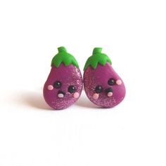 A little pair of pretty eggplant earrings. A very beautiful piece of handmade jewelry/mini food jewelry which has been handmade with polymer clay by myself, they are completely adorable! Nice gift for anyone! - Earring studs are stainless steel - Earrings measure 1,3 cm big I love to making custom orders! I'll work with you to make something completely unique and exactly how you want it; this includes shape, size and color that you adore. Let me know what you like and I'll do it.  Perfect for un Playful Purple Earrings For Gift, Playful Purple Earrings For Gifts, Playful Jewelry With Fruit Design For Gift, Playful Fruit Design Jewelry For Gifts, Purple Novelty Jewelry For Pierced Ears, Fun Purple Earrings For Gift, Cute Fruit Design Earrings For Gift, Cute Fruit Design Jewelry For Gifts, Cute Fruit Design Jewelry As Gift