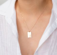 Personalized Rectangle Pendant, Personalized Rectangle Necklace, Statement Necklace, Rectangle Pendant, 14kt Gold Filled, Rectangle Necklace A modern necklace that can be crafted to be uniquely yours. Available in gold, rose gold, or silver- you can also choose from various sizes for the pendant itself. Endless options for engraving, choose a meaningful quote, word, name, date, or almost anything- or leave it blank for a minimalist look. A meaningful gift to a loved one or as a made-to-order jew Minimalist Rectangular Pendant Necklace With Engraving Option, Everyday Personalized Rectangular Pendant Necklace, Personalized Rectangular Pendant Jewelry, White Personalized Rectangular Pendant Jewelry, Personalized Rectangular Pendant Name Necklace, Rectangle Pendant Necklace, Rectangle Necklace, Modern Necklace, Rectangle Pendant