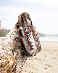 These bags are the bomb and have the wanderlust in mind + they're made from leftover fabric! Trust me, this will be your go-to bag! Take it to the beach, yoga studio or use it as a carry-on when travelin' around the globe! Size: Approximately 21" Width x 18" Height Care: Machine Wash Cold + Lay Flat to Dry Please note that due to the upcycled fabric, all prints will vary and sizes are approximate. SHIPPING INFO - For customers outside of Canada, please make sure you are choosing the correct ship Adventure Bags, Upcycled Fabric, Beach Yoga, Sac Week End, Yoga Bag, Leftover Fabric, Market Bag, Yoga Studio, Baby Bag