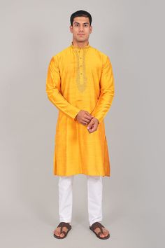 Bluesaanchi Festive Embroidered Yellow Kurta Set   Discover the perfect blend of tradition and contemporary style with the Bluesaanchi Festive Embroidered Yellow Kurta Set. Crafted to elevate your festive wardrobe, this ensemble features exquisite embroidery that adds a touch of elegance and sophistication to your look. Ideal for special occasions, this kurta set is designed to make you stand out effortlessly.  Key Features  Elegant yellow kurta with intricate embroidery  Comfortable fit with a flattering silhouette  Perfect for festive and special occasions  High-quality fabric ensures comfort and durability   Specifications  Kurta Length: Calf length  Neck: Round neck with detailing  Sleeve Length: 3/4th sleeves  Pattern: Embroidered  Occasion: Festive wear   Material & Care  Material: H Traditional Kurta For Puja In Transitional Season, Cotton Silk Straight Kurta With Embroidered Border, Salwar Kameez With Resham Embroidery For Diwali, Bollywood Straight Kurta With Embroidered Border, Straight Kurta With Embroidered Border For Festivals, Traditional Straight Kurta For Puja, Traditional Kurta With Pallu For Navratri, Straight Art Silk Kurta With Cutdana, Traditional Kurta For Navratri Puja