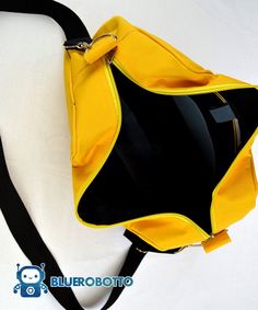 "All products are made to order. Orders take up to 4 weeks to be made and shipped. . Welcome to BlueRobotto .-.-.-.-.-.-.-.-.-. The bag in the photos is yellow. With this stylish messenger bag you can show off your fandom, your travel pics or even your pet photos everywhere you go. The front of the bag is transparent, with a window looking to the interior panel, where you can customize it however you like, place your pins, buttons, pictures, keychains and even small plushies. We used some safety Yellow Rectangular Satchel With Large Capacity, Yellow Large Capacity Satchel Canvas Bag, Yellow Canvas School Bag, Yellow Satchel With Removable Pouch For School, Yellow School Shoulder Bag With Adjustable Strap, Yellow School Satchel With Removable Pouch, Yellow Canvas Satchel Bag, Yellow Shoulder Bag With Adjustable Strap For School, Yellow Shoulder Bag Satchel For School