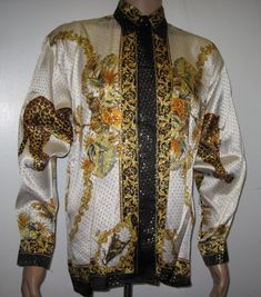 "One of the kind this Beautiful Leopard shirt European Style inspired,Multicolored Metallic Silk with hidden gold finish buttons. Gold & White nice in excellent condition, Men Tags Size: Medium ,Large & XL only Comfort Fit with beautiful details Unisex Adults ,please See Measurements for proper fit. TAG SIZE SMALL : Armpit to Armpit with the shirt lying flat : 22\" inches, Sleeve Length, measured from the top of the shoulder seam to the end of the arm cuff :23\" inches , Length from Coll Gold Baroque Print Formal Tops, Gold Baroque Print Top For Formal Occasions, Formal Gold Tops With Baroque Print, Formal Gold Top With Baroque Print, Gold Long Sleeve Tops With Baroque Print, Gold Long Sleeve Top With Baroque Print, Long Sleeve Gold Tops With Baroque Print, Vintage Gold Silk Top, Gold Party Tops With Buttons