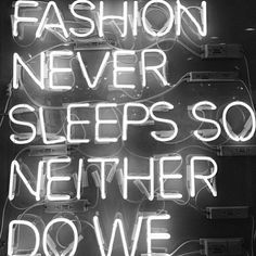 a woman sitting on the ground with her legs crossed in front of her face and text reading fashion never sleeps so nether do we