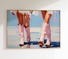 a painting of two women's legs in pink cowboy boots on a white wall