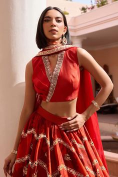 Red lehenga with an attached cancan, floral print and floral, thread and mirror embroidery. Comes with a padded draped blouse and a dupatta. - Aza Fashions Lehenga Silk, Isha Gupta, Stylish Drapes, Lehenga Pattern, Mirror Embroidery, Draped Blouse, Red Lehenga, Indian Wedding Wear, Guest Attire