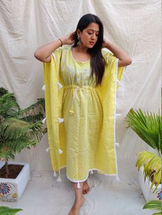 Soft cotton bandhani kaftan. Summer Bandhani Print Kaftan, Yellow Chikankari Embroidery Kaftan, Traditional Cotton Kurta With Back Tassel Tie-up, Bohemian Bandhani Print Maxi Kurta, Traditional Bandhani Print Summer Kaftan, Traditional Kaftan With Back Tassel Tie-up For Vacation, Free Size Cotton Kaftan, Summer Yellow Bandhani Print Kurta, Yellow Bandhani Print Kurta For Summer