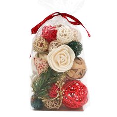 a bag filled with assorted christmas decorations