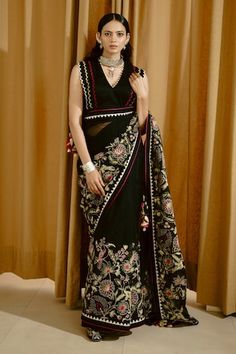 Black saree with aari thread embroidered floral motifs and scalloped border. Comes with padded scalloped border blouse. - Aza Fashions Anarkali Saree With V-neck And Resham Embroidery, Anarkali Saree With Resham Embroidery, V-neck Lehenga With Resham Embroidery For Diwali, Diwali Lehenga With Resham Embroidery And V-neck, Traditional V-neck Set With Sheer Dupatta, Georgette Blouse Piece V-neck For Designer Wear, V-neck Choli With Dupatta For Diwali, Diwali V-neck Choli With Dupatta, Georgette V-neck Blouse With Zari Work