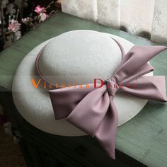 Vintage Pink Bow Lolita Hat for Wedding Condition: Brand NewColor: WhiteSize: One Size(Diameter: about 30cm)Material:SatinSuitable season: Spring/Summer/Autumn/ WinterPopular elements: BowOccasion : Wedding/Birthday/Holiday/Anniversary Celebration/Anniversary CelebrationWhat is a Fascinator ?Fascinators have received a lot of attention since the Royal Wedding of Prince William to Catherine Middleton last spring. These not-quite-hats, not-quite-barrettes are a great way to make a statement withou Wedding Hats With Bow And Short Brim, Elegant Wedding Hats With Satin Bow, Elegant Wedding Hats With Ribbon, Adjustable Hats With Bow For Wedding, Elegant Fitted Fascinator With Ribbon, Adjustable Wedding Hats With Bow, Elegant Wedding Hat With Bow, Wedding Fascinator With Fitted Satin Bow, Wedding Fascinator With Satin Bow