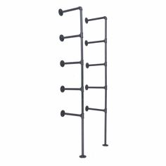 a metal rack with four bars and two balls on the top, against a white background