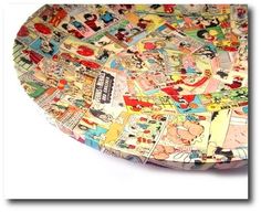 a bowl that has cartoon characters on it and is sitting on a table top with white background