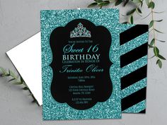 a blue and black birthday card with a tiara on it