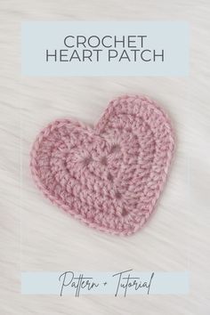 the crochet heart pattern is shown in pink