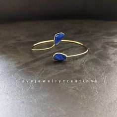 Hand made lapis lazuli bangle bracelet, with a 18k yellow gold finish. Gold Lapis Lazuli Bracelet With Gemstone, Gold Lapis Lazuli Gemstone Bracelet, Gold Lapis Lazuli Bracelets For Gift, Blue Brass Bracelet, Always And Forever, Druzy Ring, Bangle Bracelet, Lapis Lazuli, Gold Finish