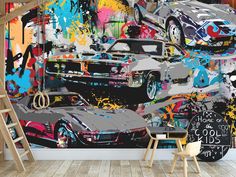 a wall mural with cars painted on it