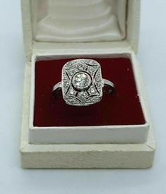 an antique diamond ring in a box