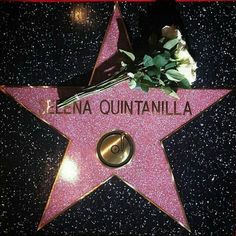 a star on the hollywood walk of fame with flowers in it and writing that reads fezza quintanilla