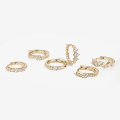 For the girl who sets her own style rules: Meet the Tate earring set. With its six-piece collection of all-asymmetrical pieces, you’re free to create a look that’s uniquely yours. Forget left and right—mix and match to your heart’s content and embrace your own fashion freedom. Created with a sterling silver base and utilizing luxury 14 karat gold plating, this Adorn Luxe hoop earring set can be enjoyed season after season. Fine Jewelry Drop Cartilage Earrings, Fine Jewelry Cartilage Drop Earrings, Elegant Stackable Huggie Earrings, Everyday Fine Jewelry Piercings, Elegant Stackable Everyday Earrings, Single Ear Cuff In Fine Jewelry Style, Everyday Stackable Earrings, Hoop Earring Set, Pearl Statement Earrings