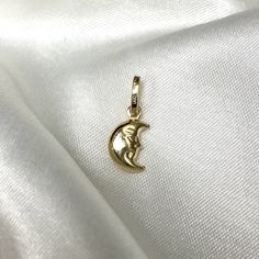 14K Yellow Gold Half Moon Face Charm Pendant Celestial Charm Necklace, Minimalist Dainty Jewelry gift ideas for men and women ✅ PENDANT SPECIFICATIONS: * Double Sided - 3D * Height: 0.43 in. (11 MM) * Width: 0.39 in. (10 MM) * Average Weight: 0.58 gr. * Type: Other/Half Moon * Bale Size (mm): 5 ✅ PREMIUM 14K GOLD:  Our jewelry is crafted from durable high quality materials, gems, and stones; hand-stamped for authenticity as well as FTC law approved. Unlike cheap costume jewelry, our long lasting Minimalist Moon Charm Necklace Gift, Minimalist Moon Charm Necklace As Gift, Minimalist Half Moon Charm Necklace As Gift, Everyday Moon Charm Necklaces, Everyday Moon Charm Necklace, Yellow Gold Moon Charm Necklace As Gift, Minimalist Moon Charm Necklace For Gift, Moon Charm Pendant As Gift, Moon Shaped Yellow Gold Charm Necklace As Gift