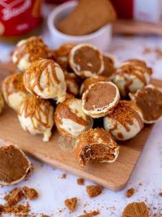 some kind of dessert on a wooden cutting board