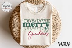 a white t - shirt with the words merry and grandma on it next to a wicker basket