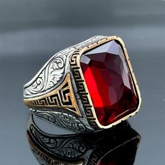 Silver Ruby Stone Ring , Man Handmade Silver Ring , Ruby Red Stone Ring , Father Day Gift , Ottoman Style Ring , 925k Sterling Silver Ring ★Item Details * Gender : Male / Female * Material : 925K Sterling Silver * Total weight : 17 Grams * Gemstone : Ruby  Stone ✔ Ready to Ship in 1-2 Business Days .. ✔ Shipped to the Worldwide 1-5 business days with free shipping... ✔ The product will be sent to you with a handmade wooden box to avoid any damage during shipping... ✔ Visit our store, browse other Men's jewelry, silver and gold collections, and find the perfect piece you're looking for... Click For Our Other Products https://www.etsy.com/shop/MercansilverTR?ref=simple-shop-header-name&listing_id=1003010735 Classic Ruby Ring Gift, Red Engraved Rings For Promise, Red Sterling Silver Engraved Ring, Engraved Ruby Ring As Gift, Vintage Red Engraved Ring For Gift, Engraved Ruby Ring Gift, Engraved Red Ring Jewelry, Luxury Engraved Ruby Ring As Gift, Classic Red Engraved Ring For Gift