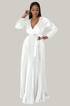 Elevate your elegance with the Eulalia Pleated Maxi Dress. Featuring a deep V-neck, wrap design, and belted high waist, this A-line dress boasts long bishop sleeves and a beautifully pleated hem. Crafted from non-stretch fabric, it offers a sophisticated and timeless look for any special occasion. Shop now to embrace refined style! 95% Polyester, 5% Elastane Model is wearing size small Please allow 3-5 business days to process and ship Long Dress Style, Boubou Styles, Boubou Styles For Women, Belted Maxi Dress, Bandage Jumpsuits, Maxi Dress Sale, Refined Style, Pleated Maxi Dress, Pleated Maxi