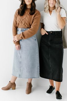 With a high waist, classic light wash, and a raw edge hem, the 'Brooke' A-Line Denim Skirt is bound to become a favorite in your denim collection! It is a true high waisted skirt designed to be worn high at the smallest part of the waist while the hem flares out for a flattering fit. We love the lived in look of this no-stretch midi denim skirt! The raw hem can easily be cut to make this skirt your desired length. Wear it casual with white sneakers and a tee or pair it with a classic button down A Line Denim Skirts, Mid Jean Skirt Outfits, Boots With Skirt, Denim Skirts, Black Jean Skirt Outfit, Midi Jean Skirt Outfits, Long Jean Skirt Outfits, Midi Jean Skirt, Black Denim Skirt Outfit