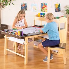 Give your budding artist the perfect comprehensive art space with the Deluxe Art Center by Guidecraft. This all-in-one activity table and storage center features a large, smooth workspace that is the perfect size for creative collaboration between more than one child. Built-in storage shelves hold paints, brushes, crayons, scissors and more. Shelving on the side of the table holds other art supplies and crafting materials. Bureau D'art, Kids Art Table, Craft Supply Storage, Drawing Desk, Shelf Bins, Toddler Table, Canvas Storage, Fabric Storage Bins, Craft Desk