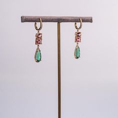 This is part of Chairish’s Fine Jewelry assortment.  The combination of the pale pinks and beautiful green tourmaline make these the chicest...The scale is appropriate for every day chic, date night or even black tie. They simply screen glamour.  14K Gold; .34 CT Diamonds; 8.6 CT Tourmaline; Hangs 1.25 Inches off the ear Elegant Tourmaline Earrings For Formal Occasions, Elegant Tourmaline Earrings With Gemstone Accents, Elegant Tourmaline Teardrop Earrings, Elegant Tourmaline Drop Earrings, Elegant Tourmaline Dangle Earrings, Elegant Green Tourmaline Earrings, Accessories Jewelry Earrings, Green Tourmaline, Black Tie