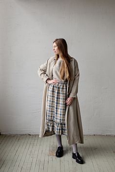 Victorian style inspired ruffle petticoat skirt is made from 100% soft and washed linen. This Petticoat is perfect for wearing under dress or other skirt or can be worn alone. Match it with our tunics! Details: - Composition: 100% Oeko-Tex certified linen - Colour: Natural/brown/Blue plaid - Pockets - Elastic waist - Size: One size/fits all - Medium weight linen - Linen care: machine wash gentle; tumble dry low, ironing optional - The price is for one skirt, other pictured items are not included Fall Daywear Skirted Bottoms, Beige Skirt For Daywear In Fall, Fall Daywear Tiered Skirt, Fall Tiered Skirt For Daywear, Knee-length Skirt For Fall Daywear, Knee-length Skirt For Daywear In Fall, Knee-length Fall Skirt For Daywear, Beige Ruffle Skirt For Fall, Fall Ruffled Beige Skirt