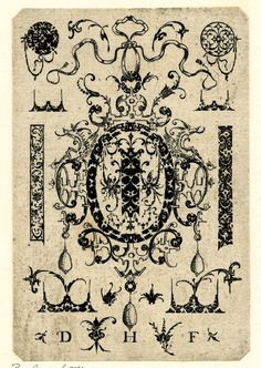 an old book with ornate designs and letters in black on white paper, including the letter d