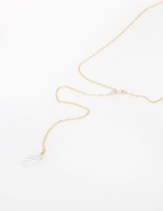 If you're looking for a delicate necklace to complement your open back bridal gown, then this is just perfect for your big day! It is entirely made of a light weight chain (Sterling Silver, Gold Filled or Rose Gold Filled), which is the go to even if you have sensitive skin. The front of the necklace has a tiny Swarovski crystal just to add a bit of spark. The back drops down and ends with a multi faceted Swarovski teardrop. This necklace is simple, but yet so elegant and it's so comfy you won't Delicate Gold Crystal Necklace For Wedding, Adjustable Wedding Backdrop Necklace With Delicate Chain, White Lariat Backdrop Necklace For Wedding, Delicate Adjustable Backdrop Necklace For Weddings, Delicate Adjustable Bridal Necklace, Single Strand Briolette Jewelry For Wedding, Adjustable Delicate Chain Necklace For Wedding, Delicate Lariat Drop Necklace For Wedding, Delicate Chain Adjustable Necklace For Wedding