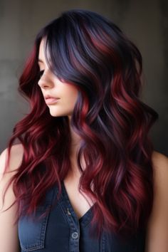 Cool-toned dark red swirls feature a deepdark red with blue undertonesThis look adds depth and complexity to curly or wavy hairstylesmaking it ideal for those with cool undertonesClick here to check out more stunning dark red hair color ideas for 2023. Red Hairstyle, Rambut Brunette, Pretty Hair Color, Winter Hair, Hair Color And Cut, Tone Hair, Summer Hair Color